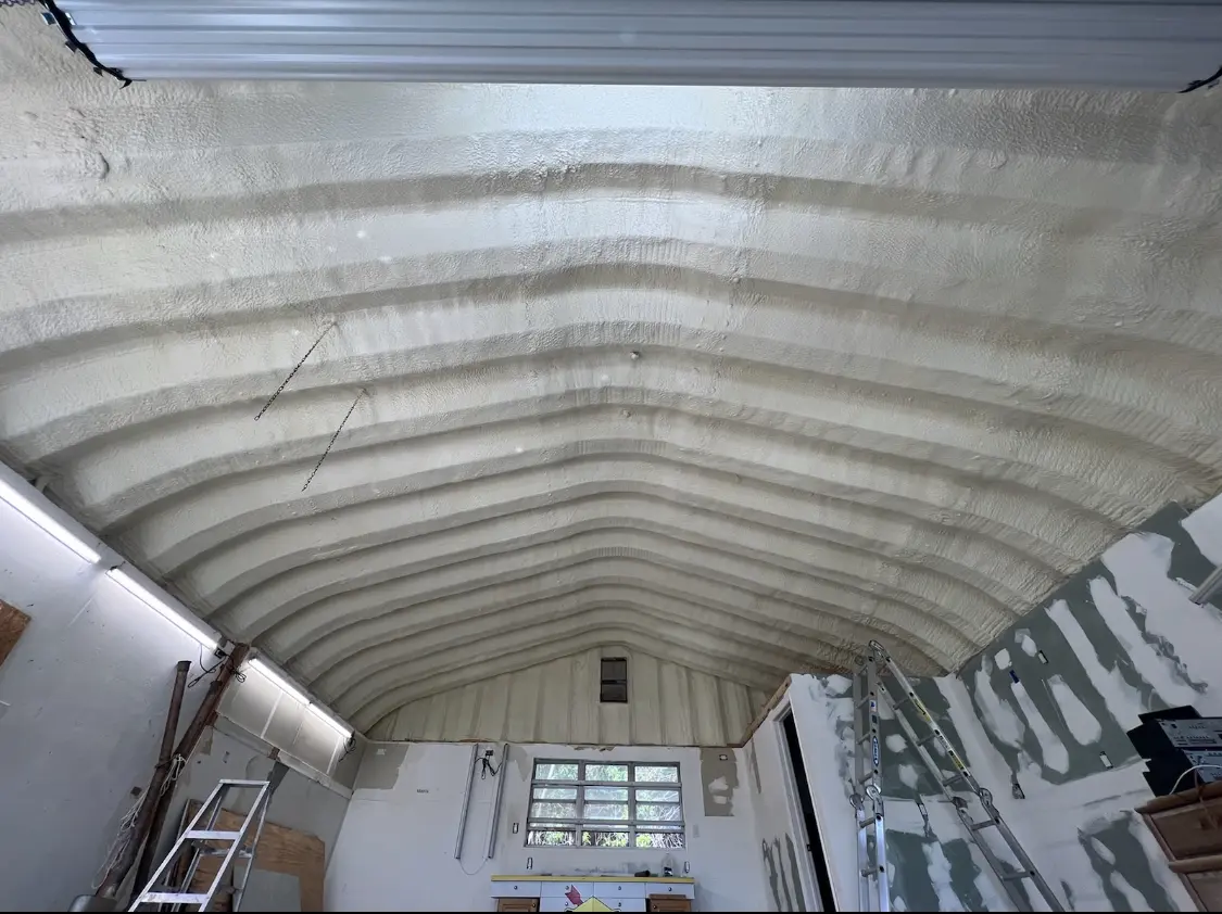 Spray polyurethane foam applied to the underside of a metal roof deck in South Daytona